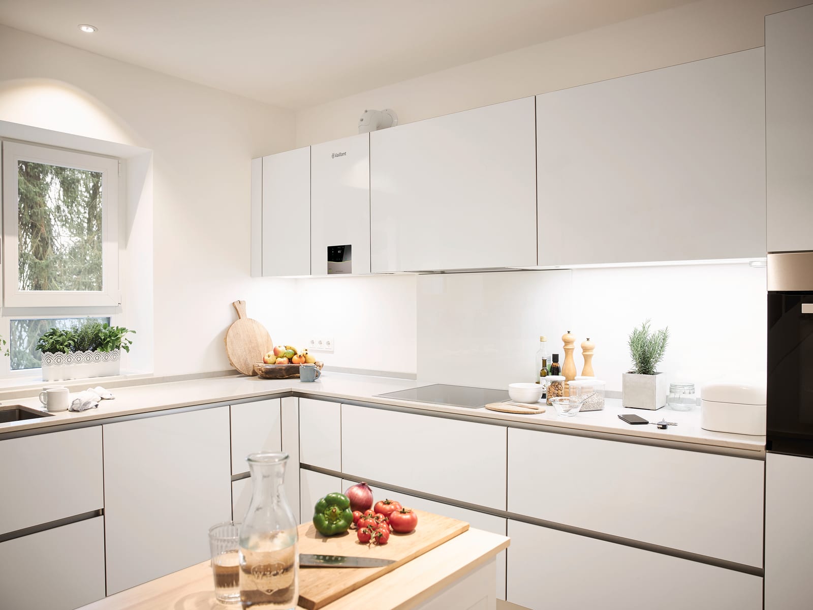 A Vaillant boiler fitted within a modern white kitchen